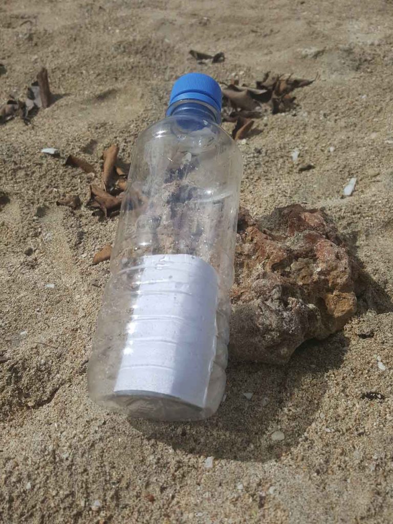 Message in a bottle on the beach